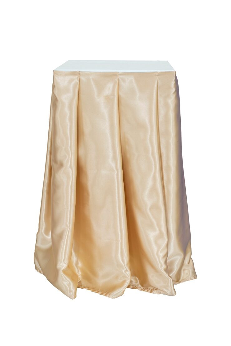 Table Covers Cloth Golden Skirt Shelf Isolated White Clipping Path by Orient Uniforms for customers in Dubai, Abu Dhabi, Sharjah, Ajman and across the UAE